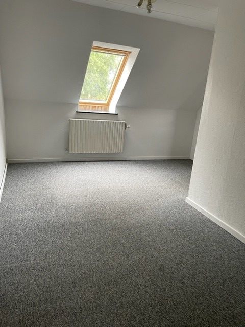 Dejlig 5 værelses lejlighed med egen gårdhave. 