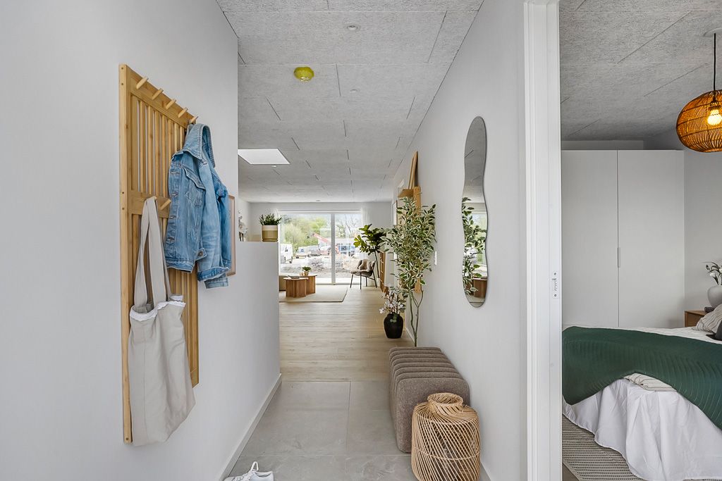 Familievenligt nyopført rækkehus i Snejbjerg med privat have/terrasse og mulighed for egen ladestander.